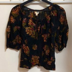 Billowy lightweight black blouse with flower print